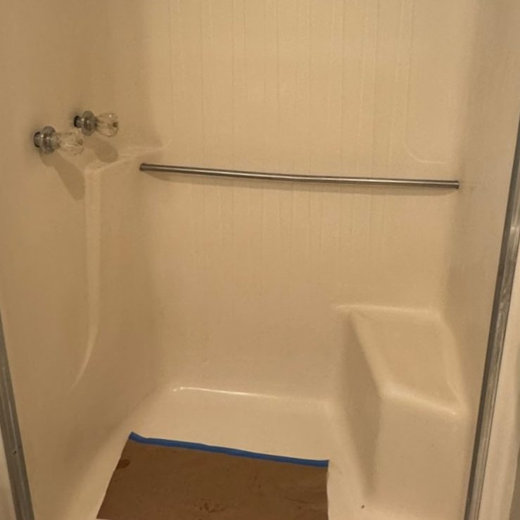 Tiled shower, back to bright — before